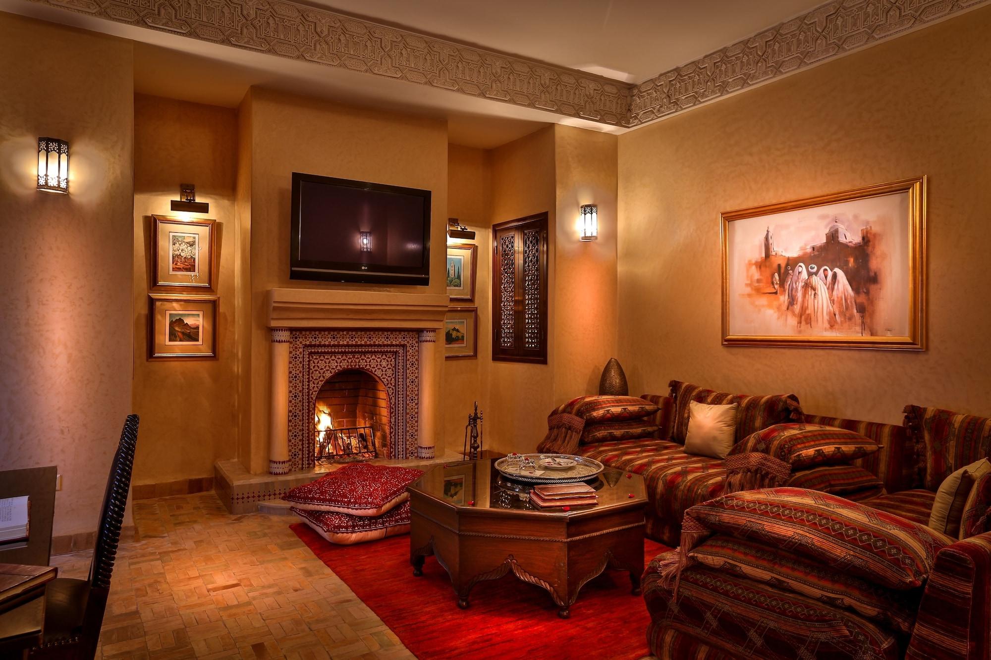 Riad Kniza Marrakesh Exterior foto A living room in a Moroccan hotel