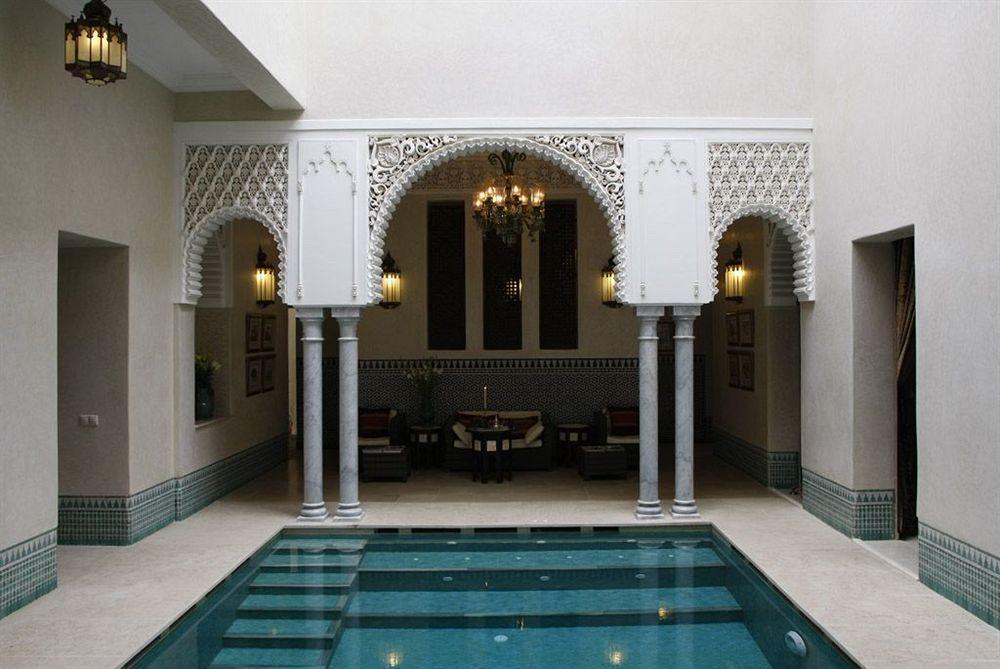 Riad Kniza Marrakesh Exterior foto The swimming pool at the hotel