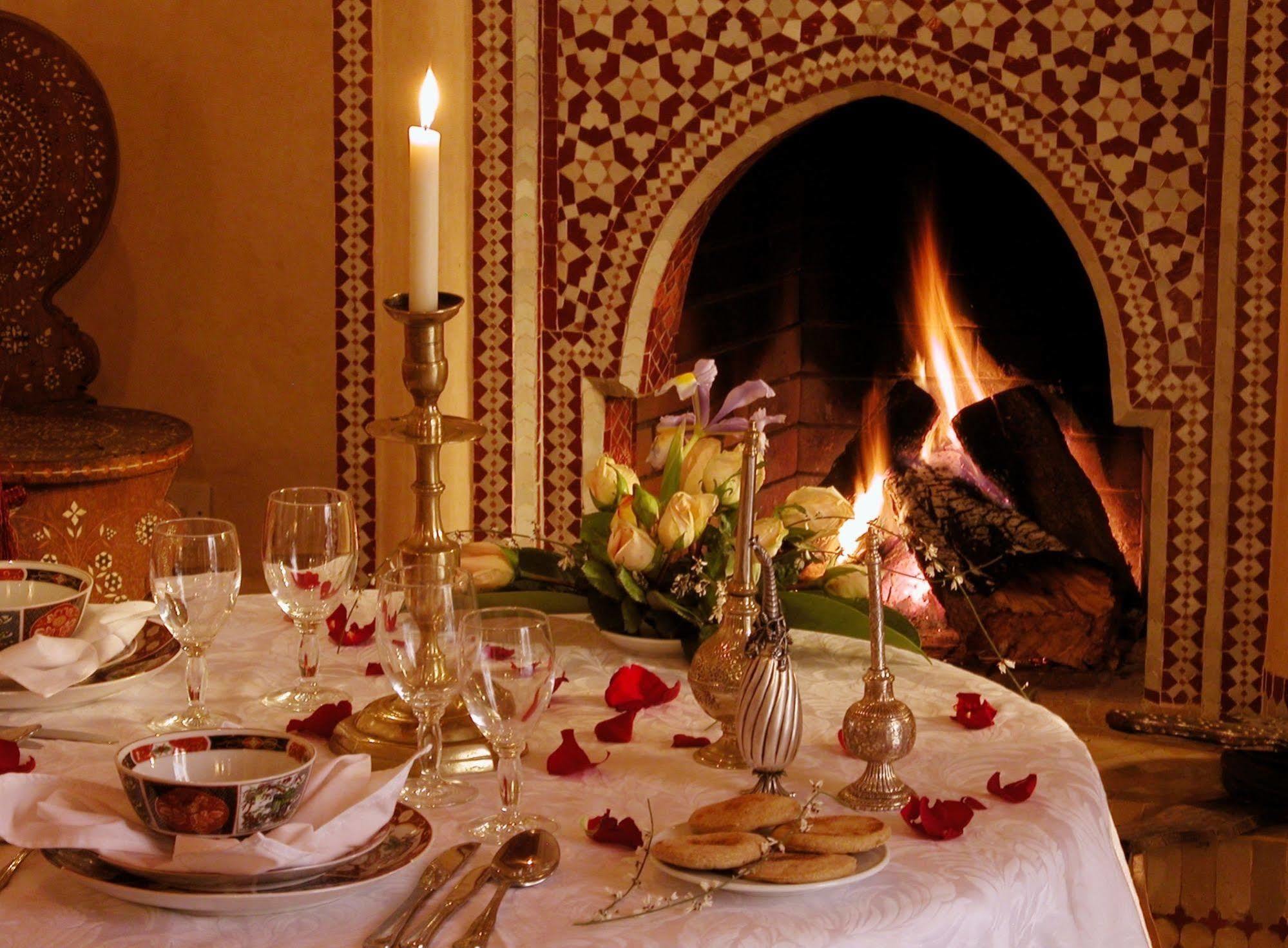 Riad Kniza Marrakesh Exterior foto A Moroccan fireplace